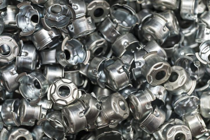 Stack of metal parts used in machinery based industry.